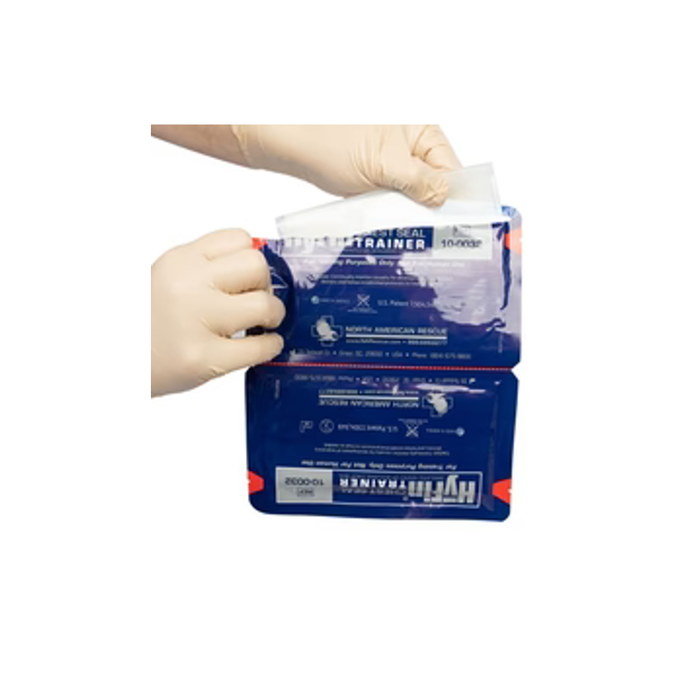 HyFin Chest Seal Trainer gauze pad and perforated packaging